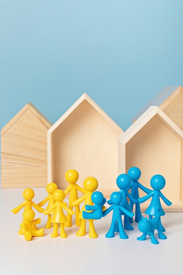 What are the best practices for building a natural shelter while camping in the UK woods?